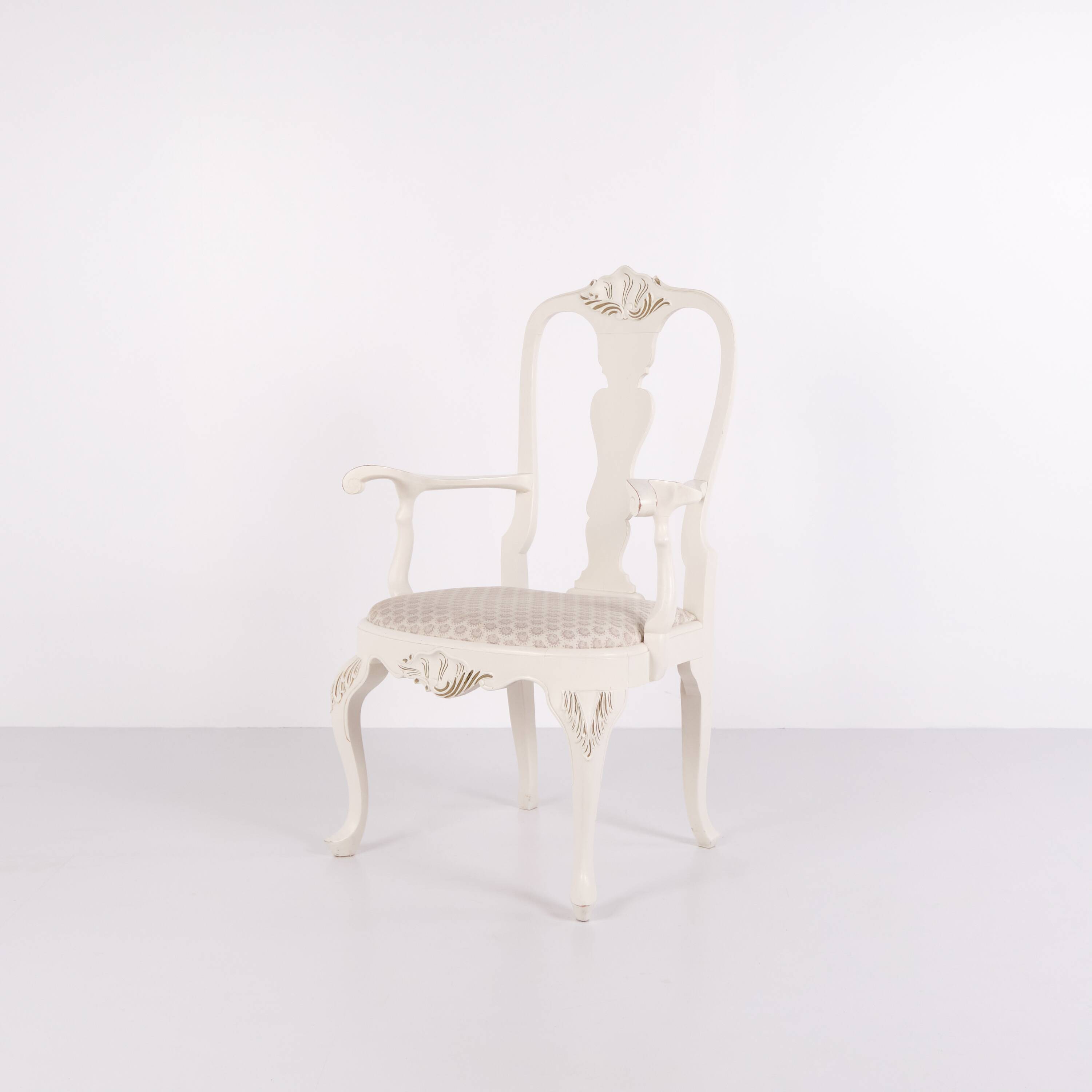 A pair of armchairs – neo rococo style – white painted with decorative details – 1920s