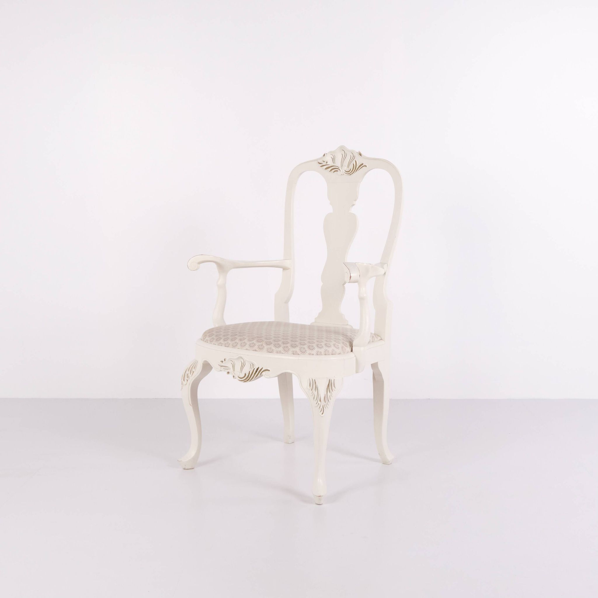 A pair of armchairs – neo rococo style – white painted with decorative details – 1920s