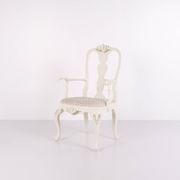 A pair of armchairs – neo rococo style – white painted with decorative details – 1920s