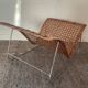 Magazine holder in woven rattan and metal