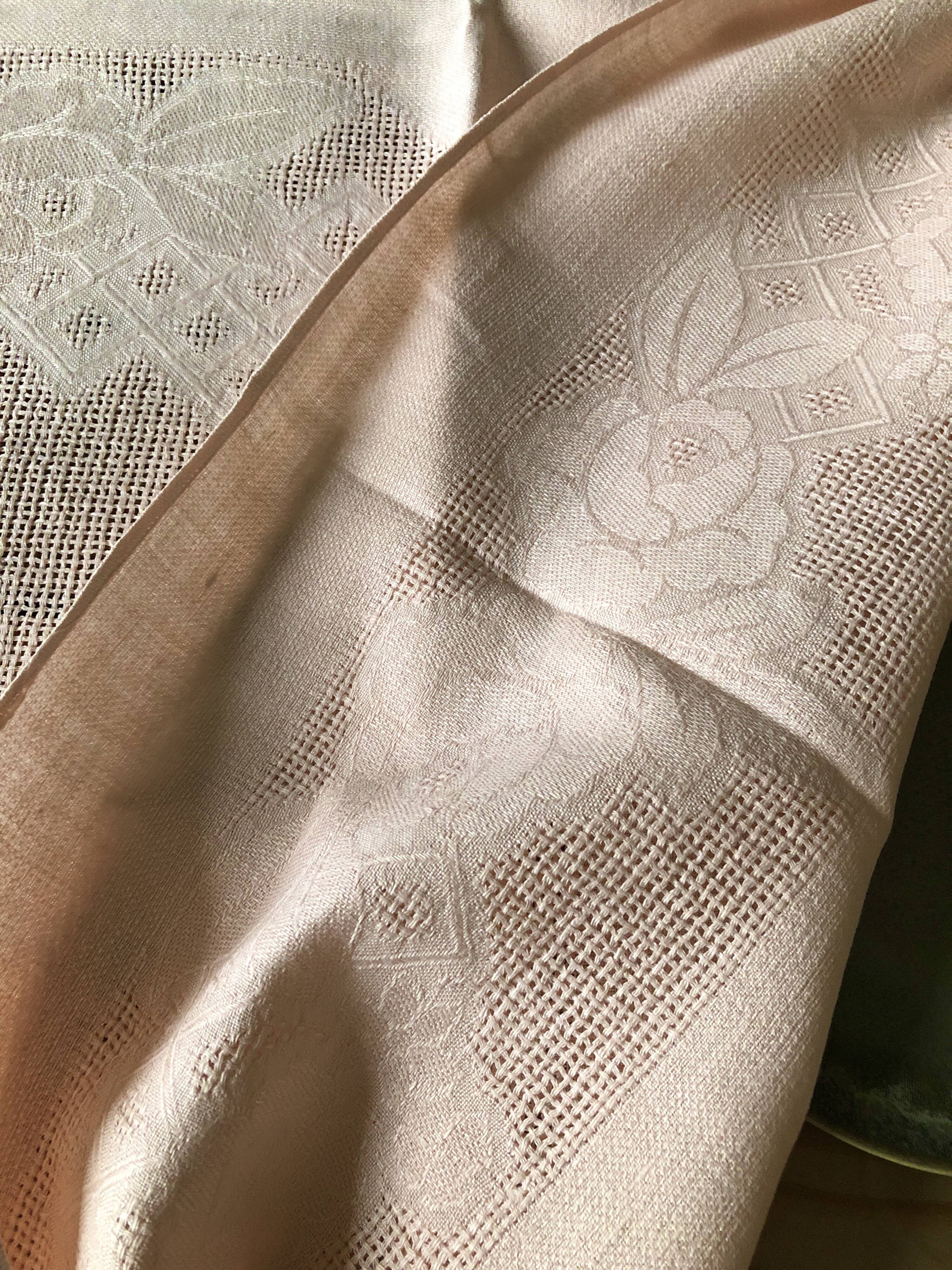 Antique tablecloth in pure linen tinted coral pink