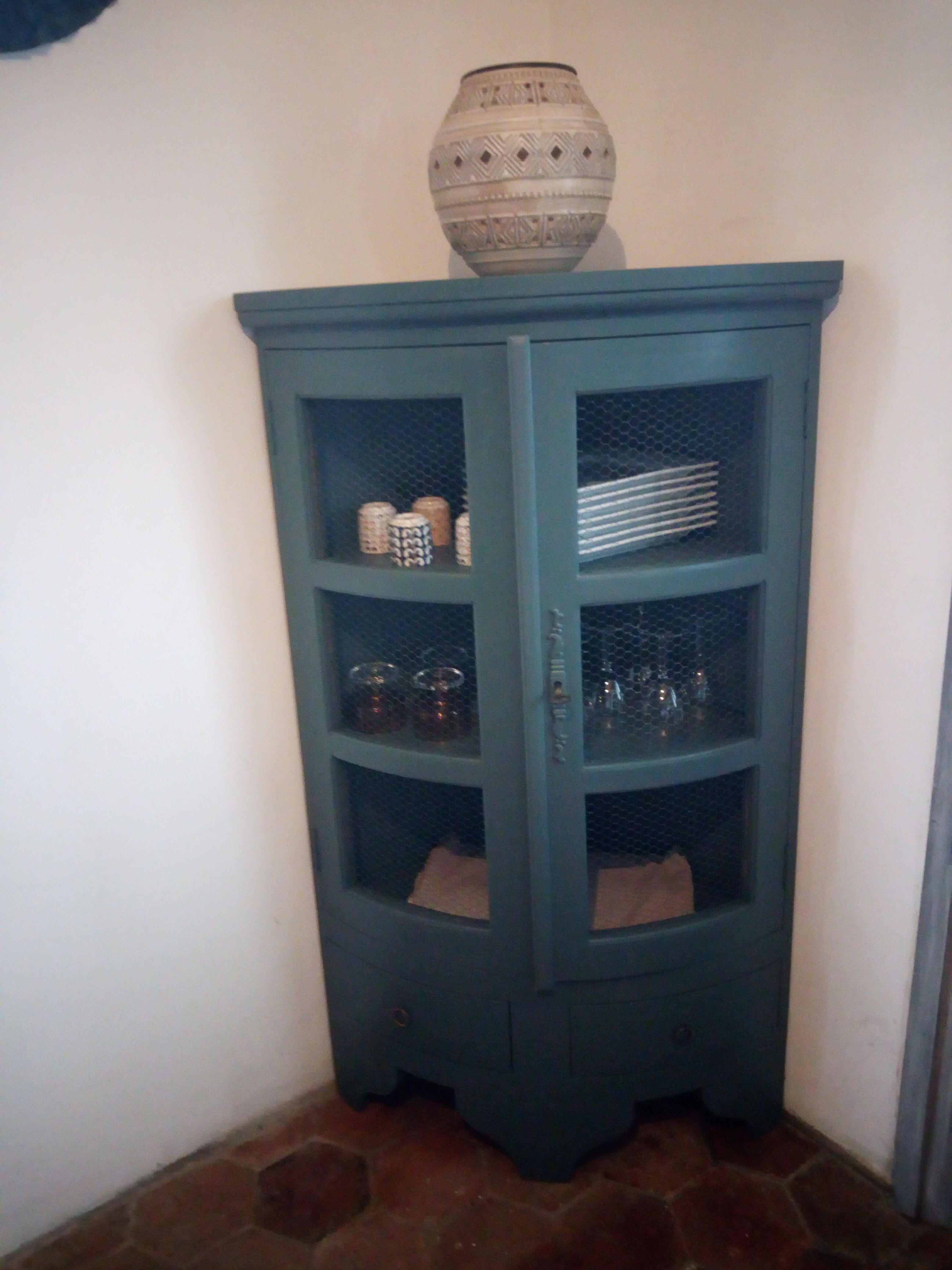 Storage in corner cabinet