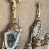 Pair of carved wood sconces
