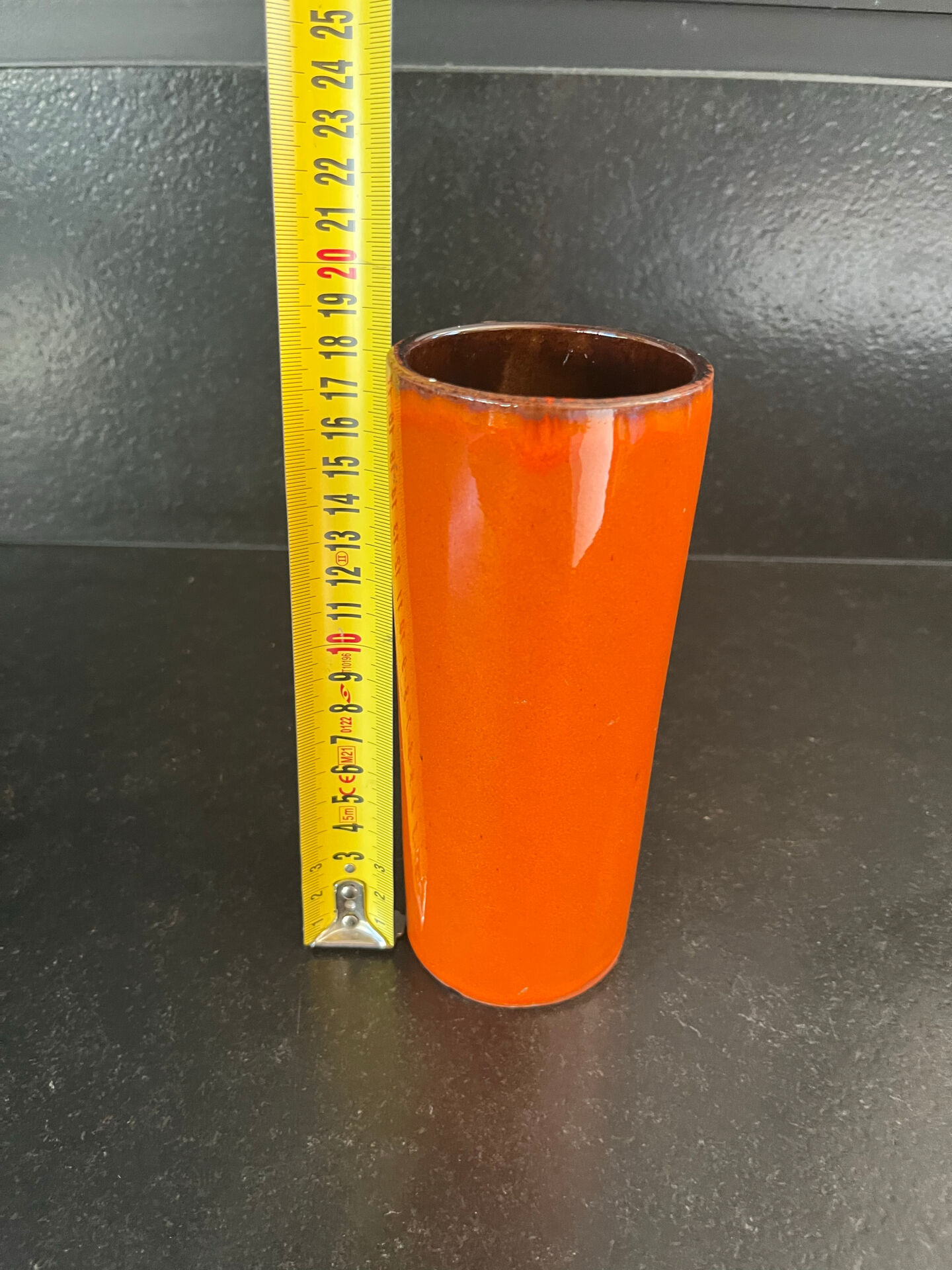 Orange glazed ceramic cylinder vase