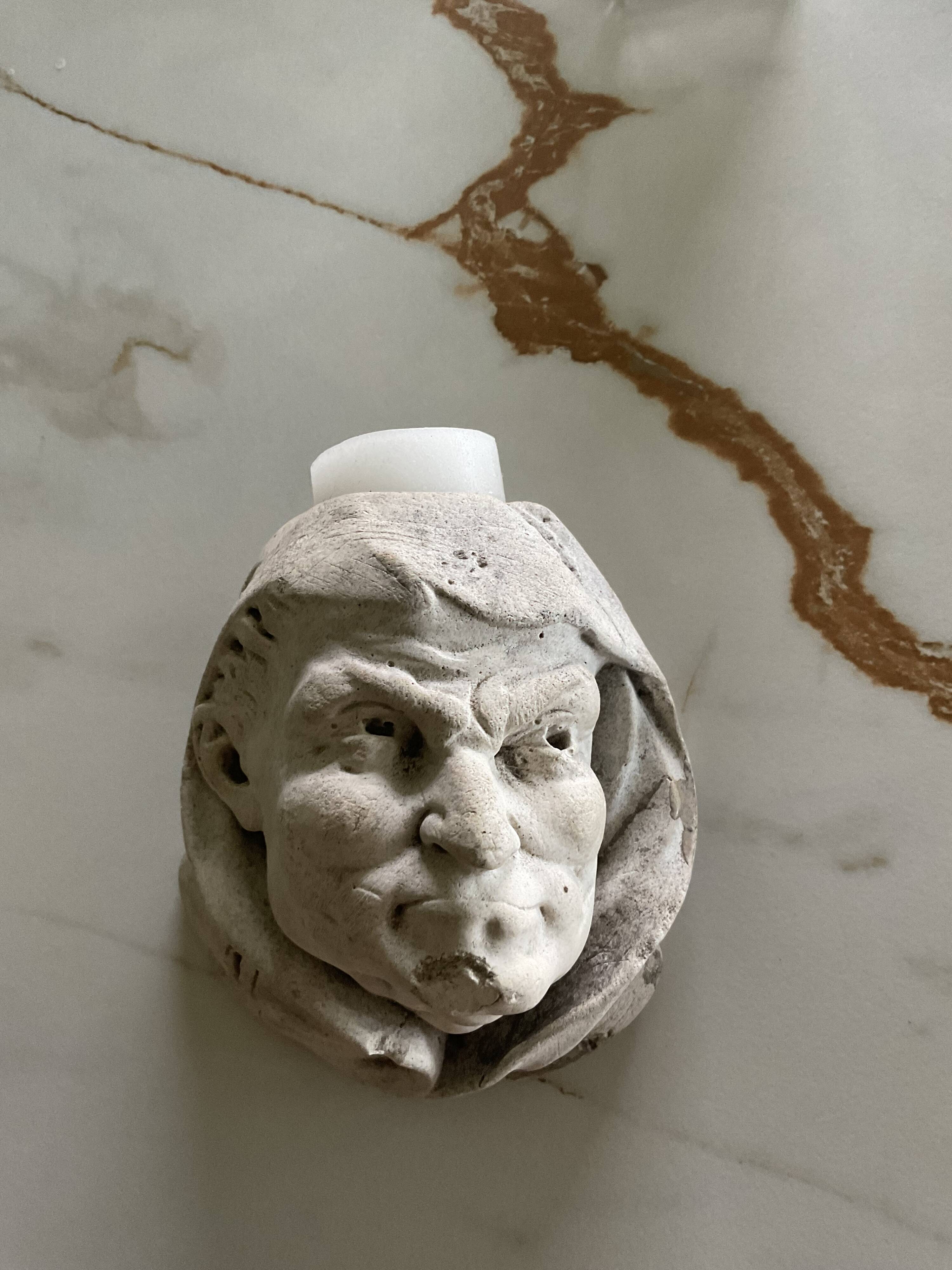 Monk's head candlestick. Antique.