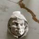 Monk's head candlestick. Antique.