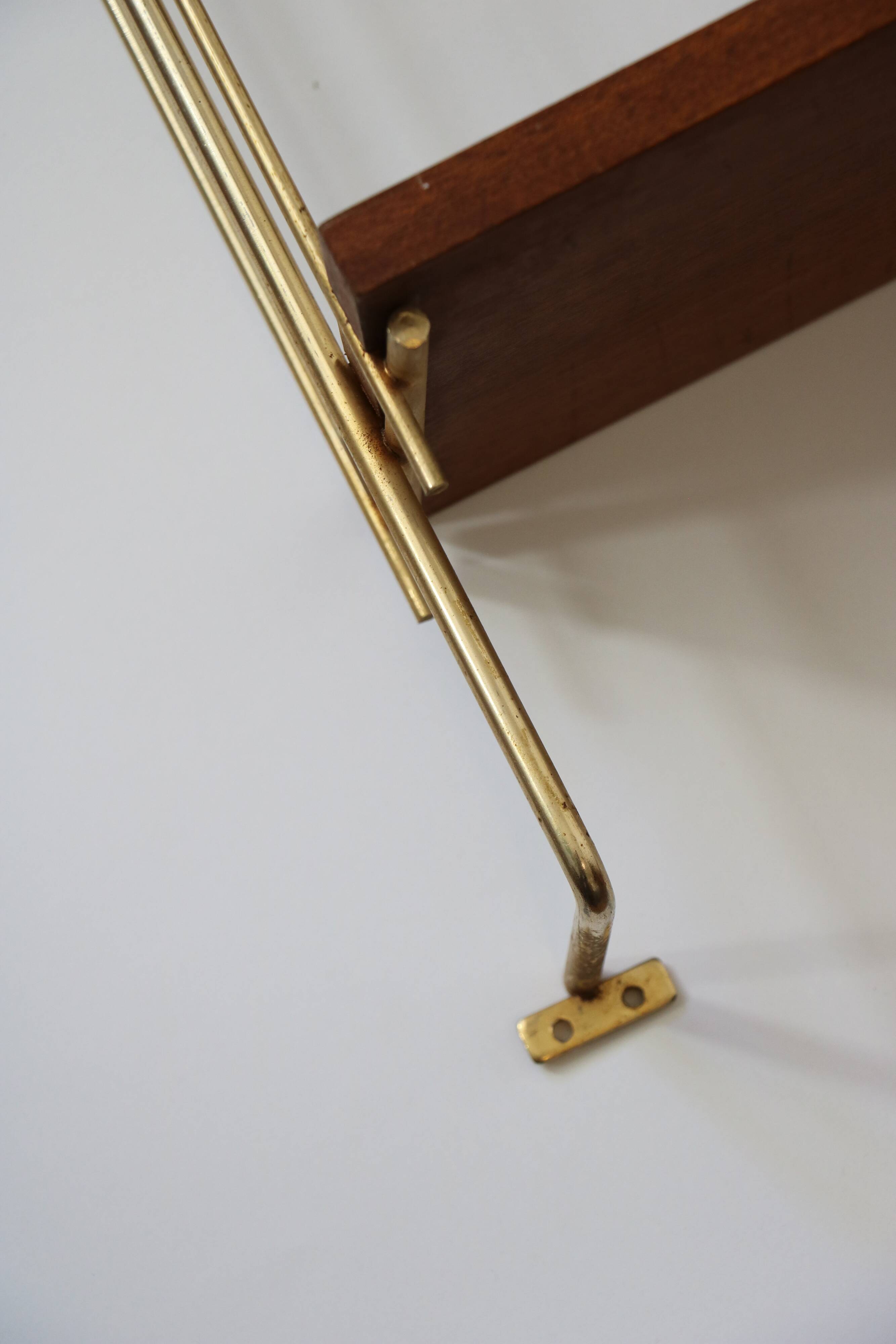 String shelf in teak and gold metal