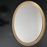 Oval mirror in gilded wood 43x53cm