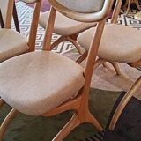 Four Scandinavian-style chairs