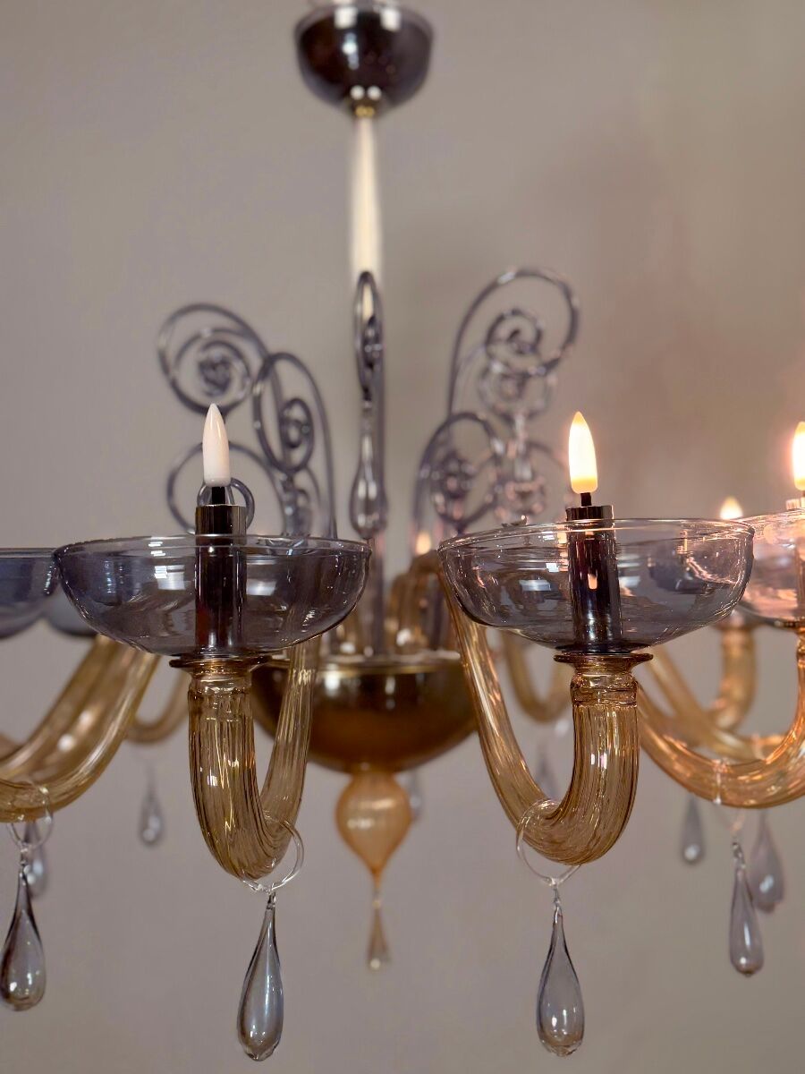 Venetian chandelier in blue and amber Murano glass, 12 light arms, circa 1980.