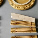 12 knife rests and 2 bottle coasters in earthenware