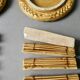 12 knife rests and 2 bottle coasters in earthenware