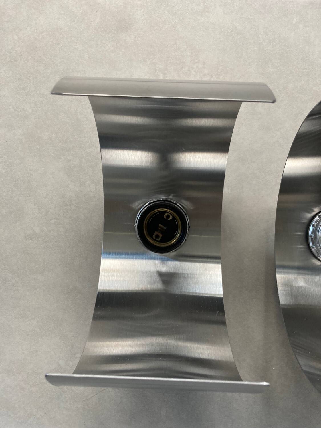 Pair of Space Age brushed metal wall lights