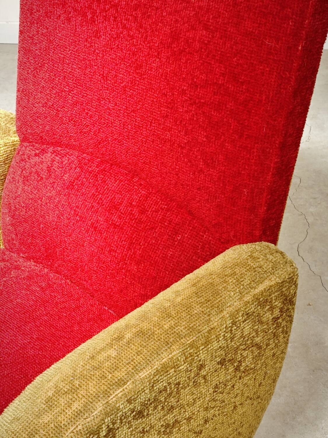 Red and mustard yellow fabric armchair in 1970s style