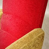Red and mustard yellow fabric armchair in 1970s style