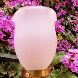 Brass wall lamp with pale pink bell