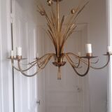 Gilded metal chandelier decorated with reeds and flowers