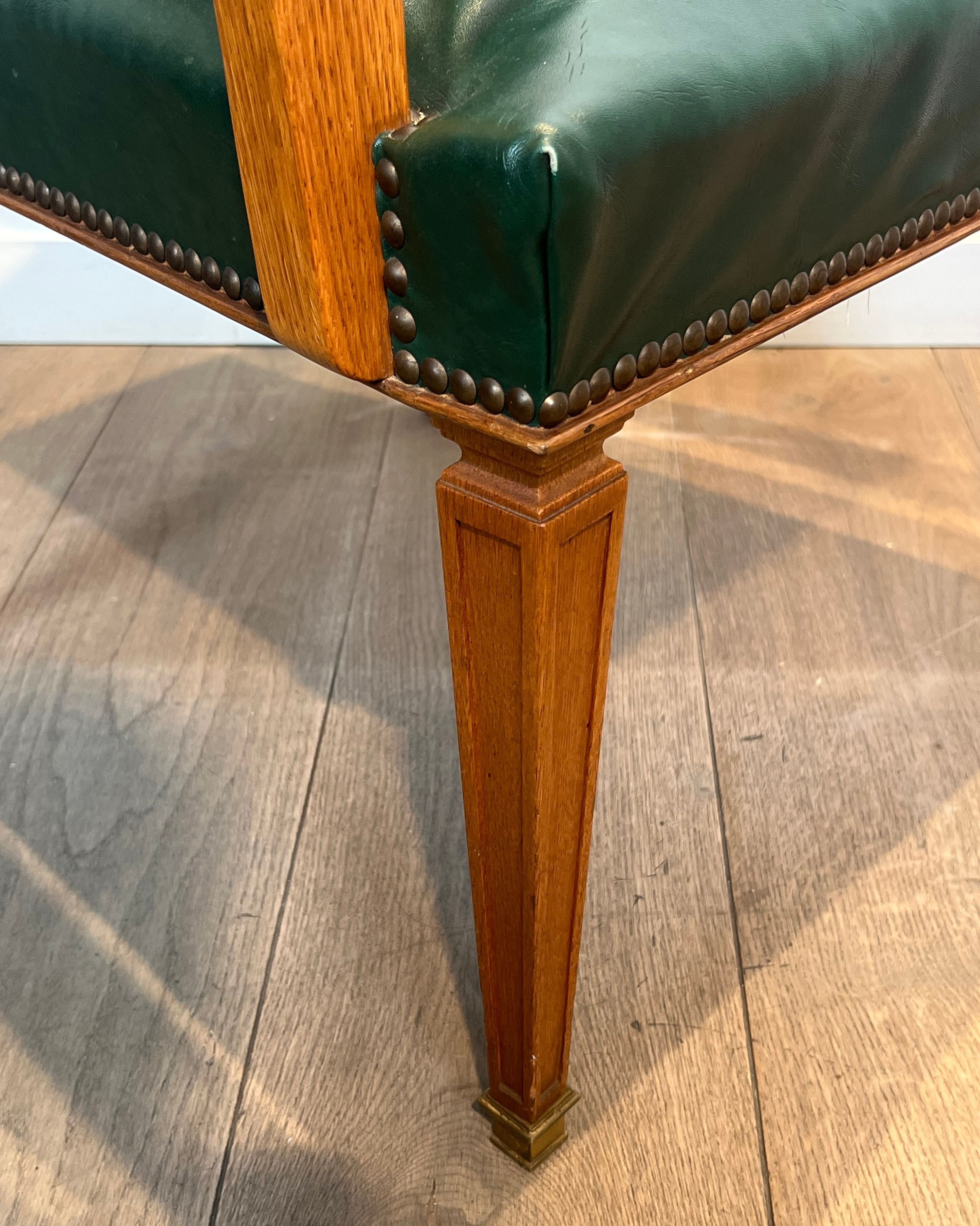 Paire de fauteuils Art déco en chêne et cuir de De Coene Frères