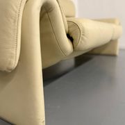 Two-seater designer sofa De Sede DS-2011 in cream leather with adjustable backrest.