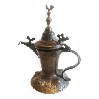 Old jug, oriental bronze coffee maker.