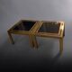 Pair of Romeo Rega side tables in brass and smoked glass, Italy 1970.