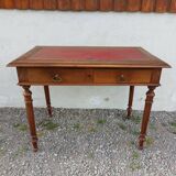 Old wooden desk, red felt top