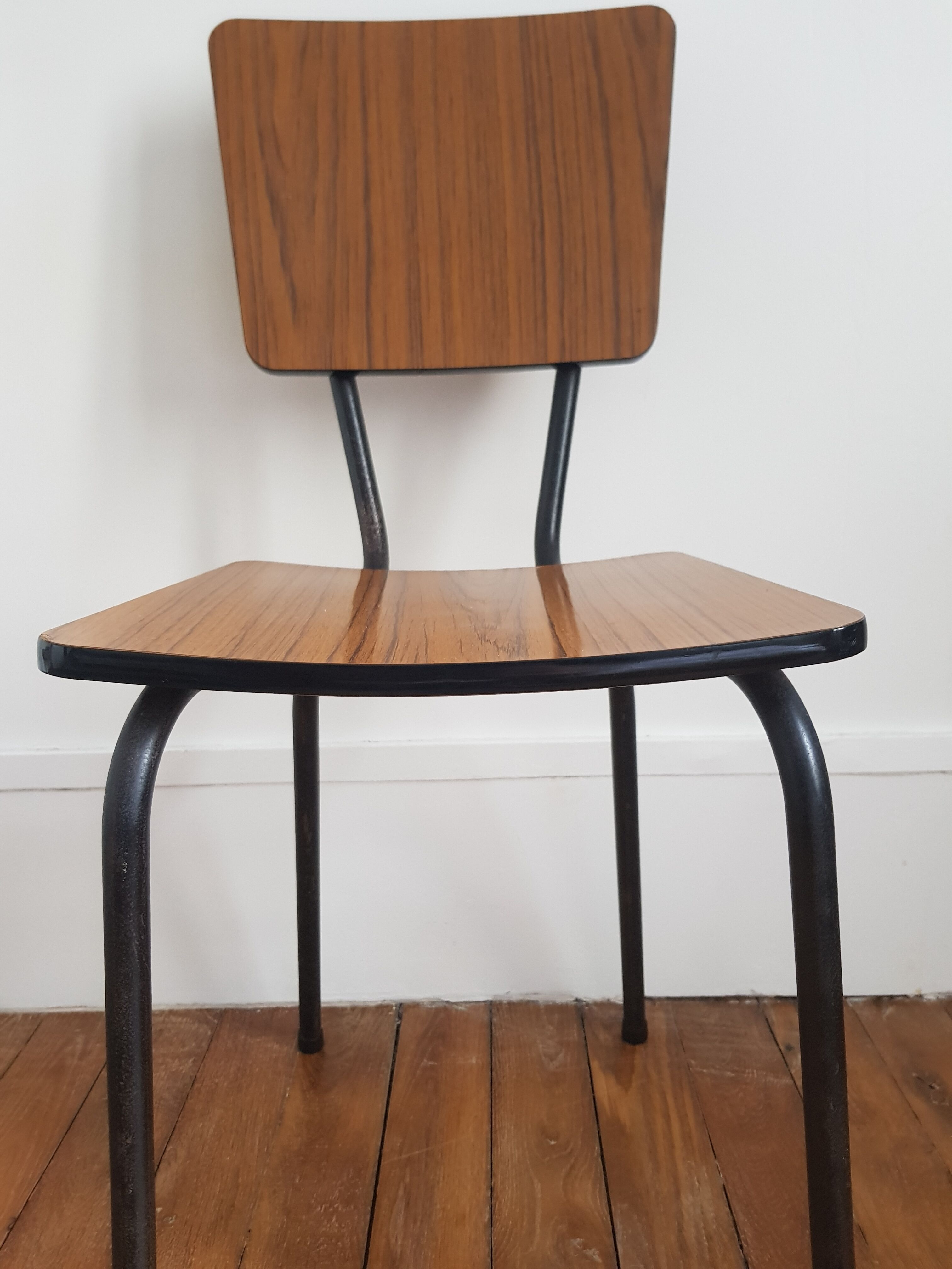Brown formica chair with black structure
