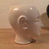 2 black and white ceramic head vases, face