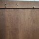 Bonnetière man standing cabinet a door