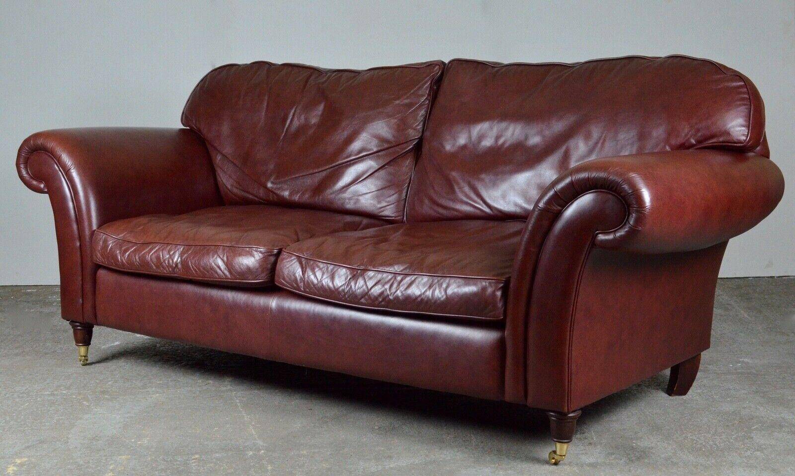 Laura Ashley Mortimer heritage leather 3-seater sofa with wheels.