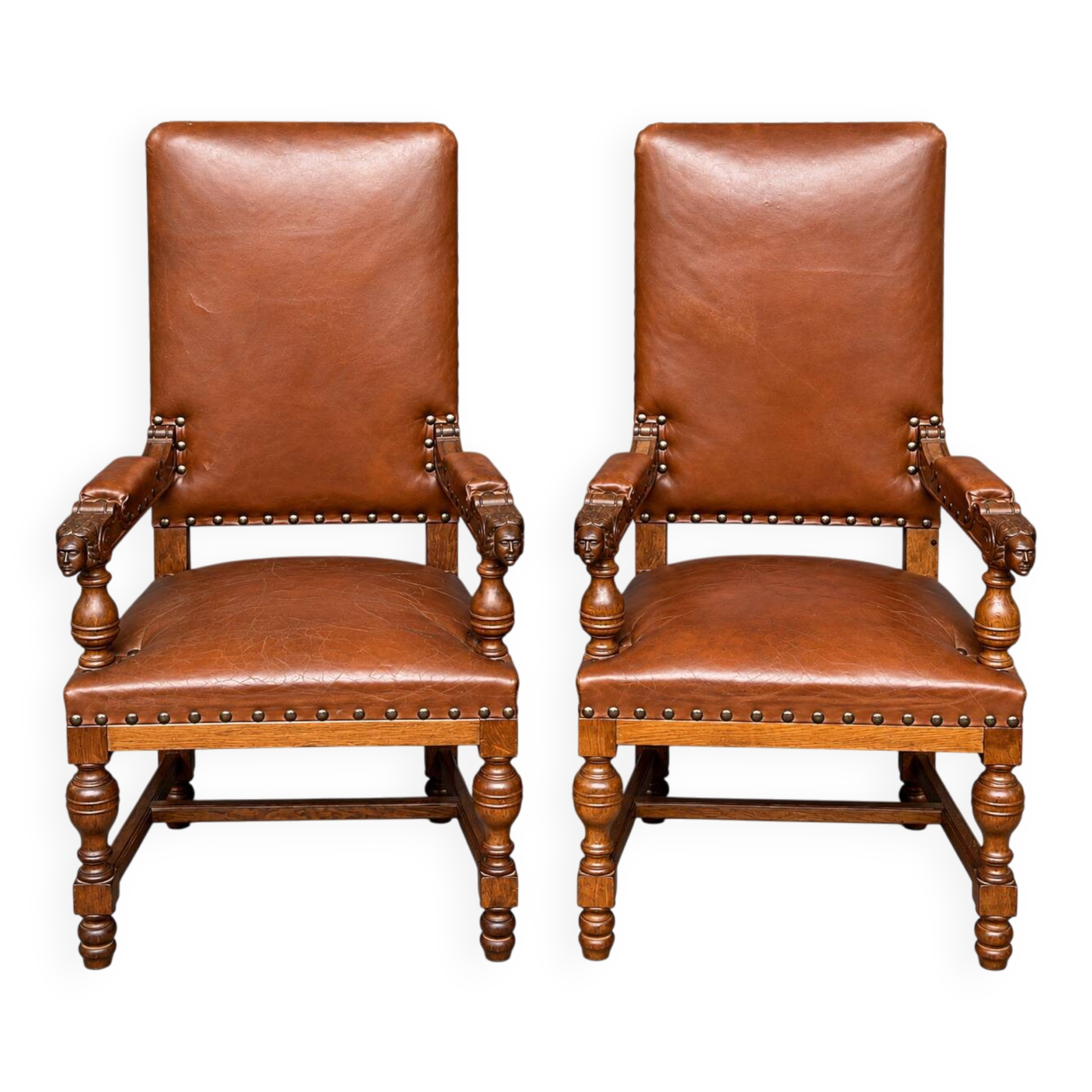Pair of Renaissance armchairs. Carved solid oak. Holland. Late 19th century.
