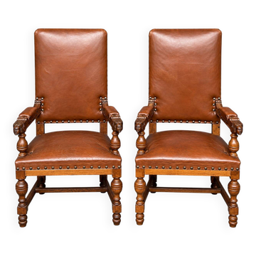 Paire de fauteuils Renaissance. Chêne massif sculpté. Hollande. Fin du XIXe siècle.