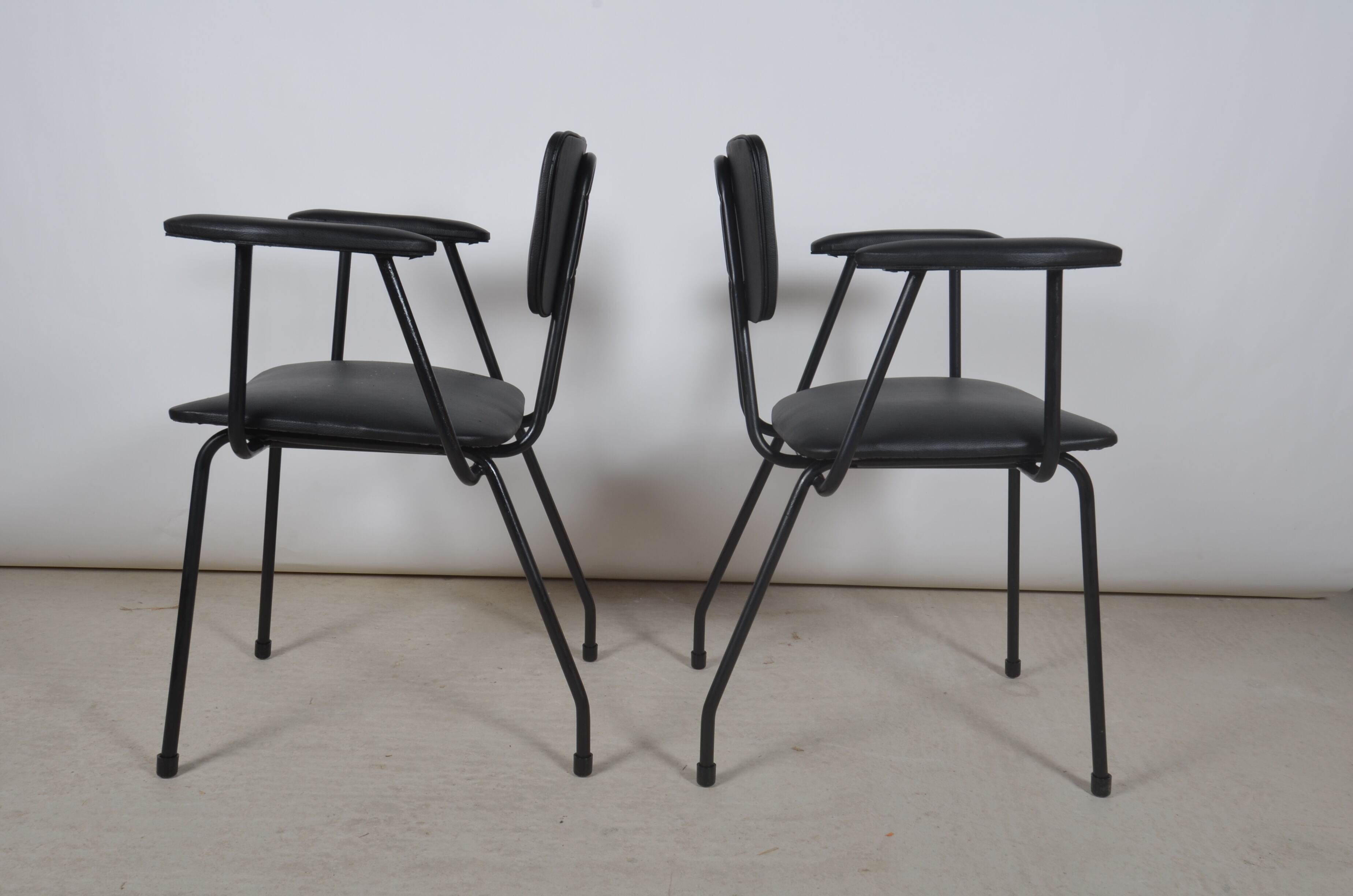 Armchairs in black skaï 1950
