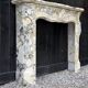 Louis XV style fireplace in purple breccia marble, circa 1880.