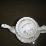White porcelain teapot with small flowers