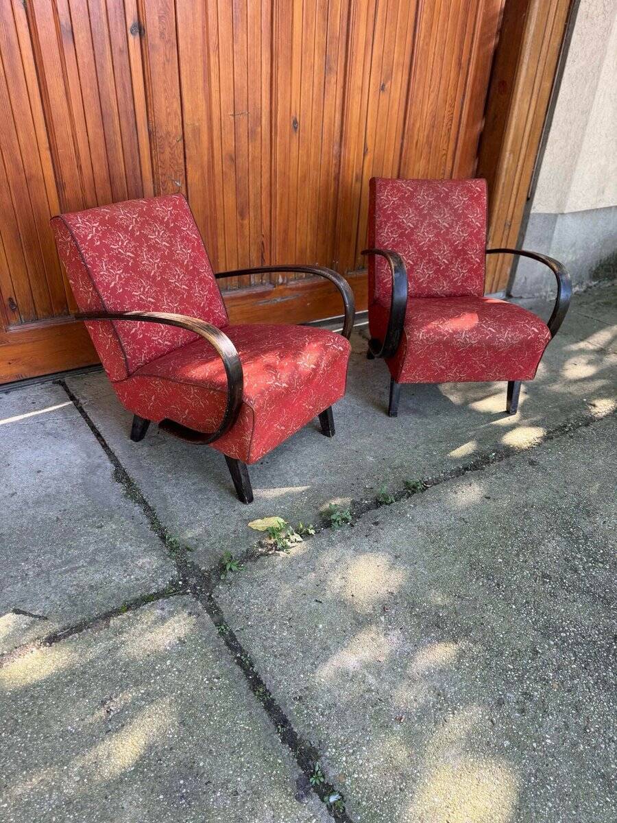 Pair of Art Deco burgundy armchairs in curved wood and fabric by Jindrich Halabala (1930s)