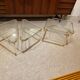 Coffee table and its 4 associated nesting tables in plexiglass and gold metal