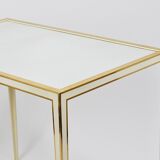 A pair of brass and white mirror tables from Vereinigte Werkstätten, Germany, 1970s.