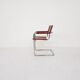 Tubular dining chair with arm rests, 1970's