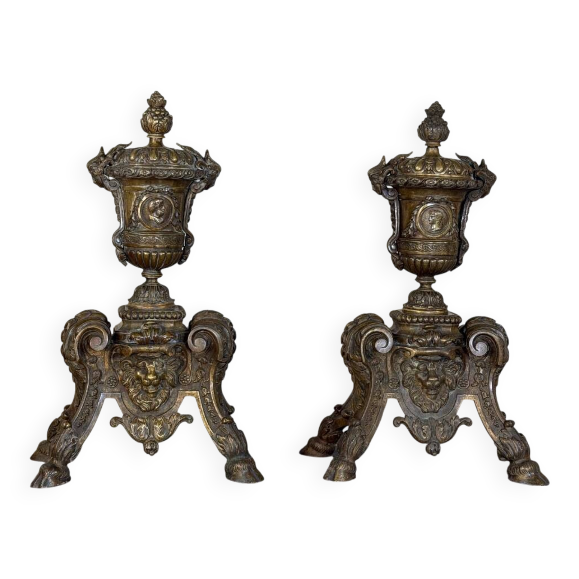 Pair of Louis XIV style andirons in bronze after a design by André-Charles Boulle.