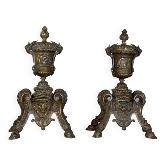 Pair of Louis XIV style andirons in bronze after a design by André-Charles Boulle.