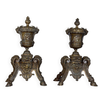 Pair of Louis XIV style andirons in bronze after a design by André-Charles Boulle.
