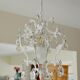 Brass chandelier with patinated tassels