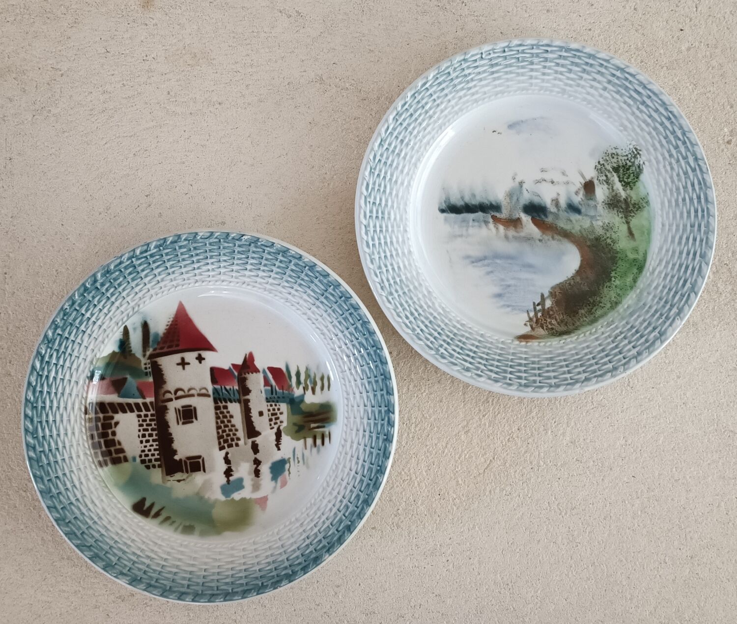 2 Saint Amand plates with castle decor