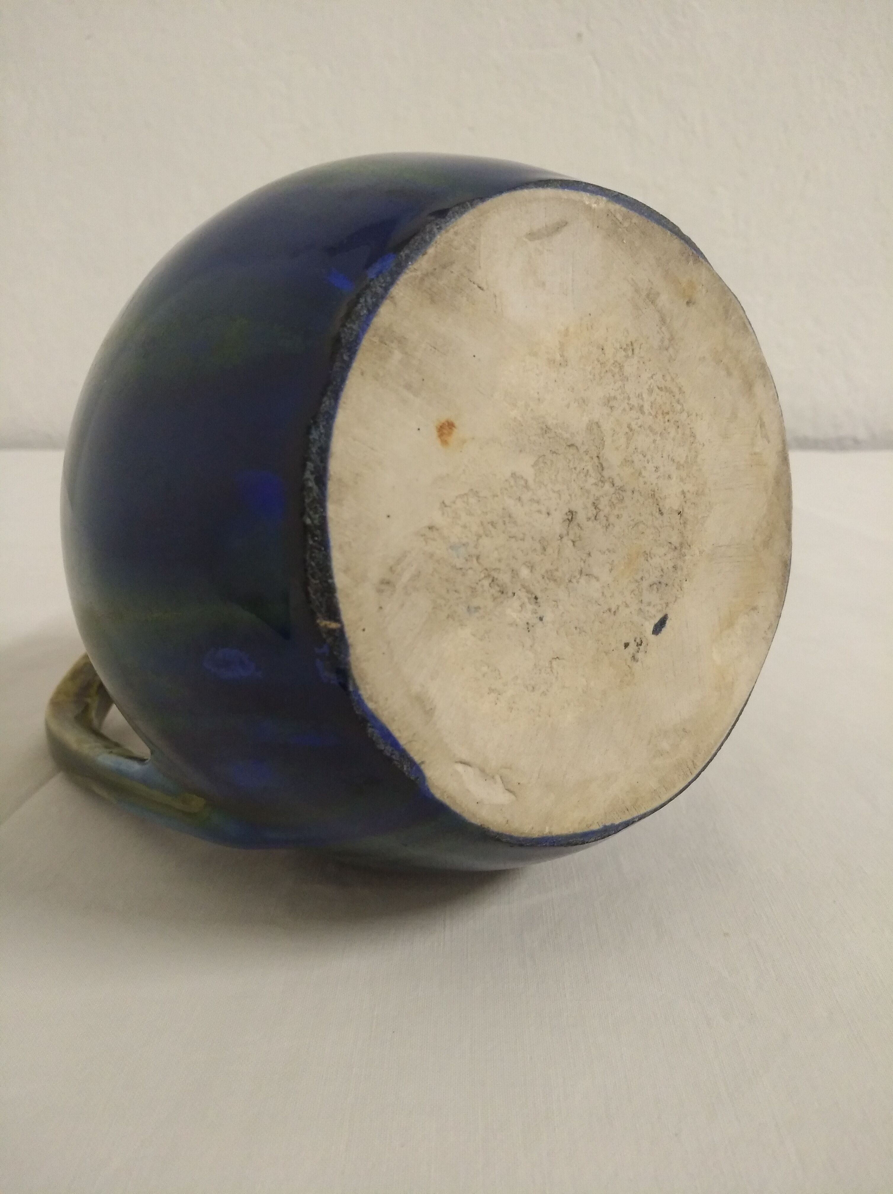 Flamed ceramic pitcher