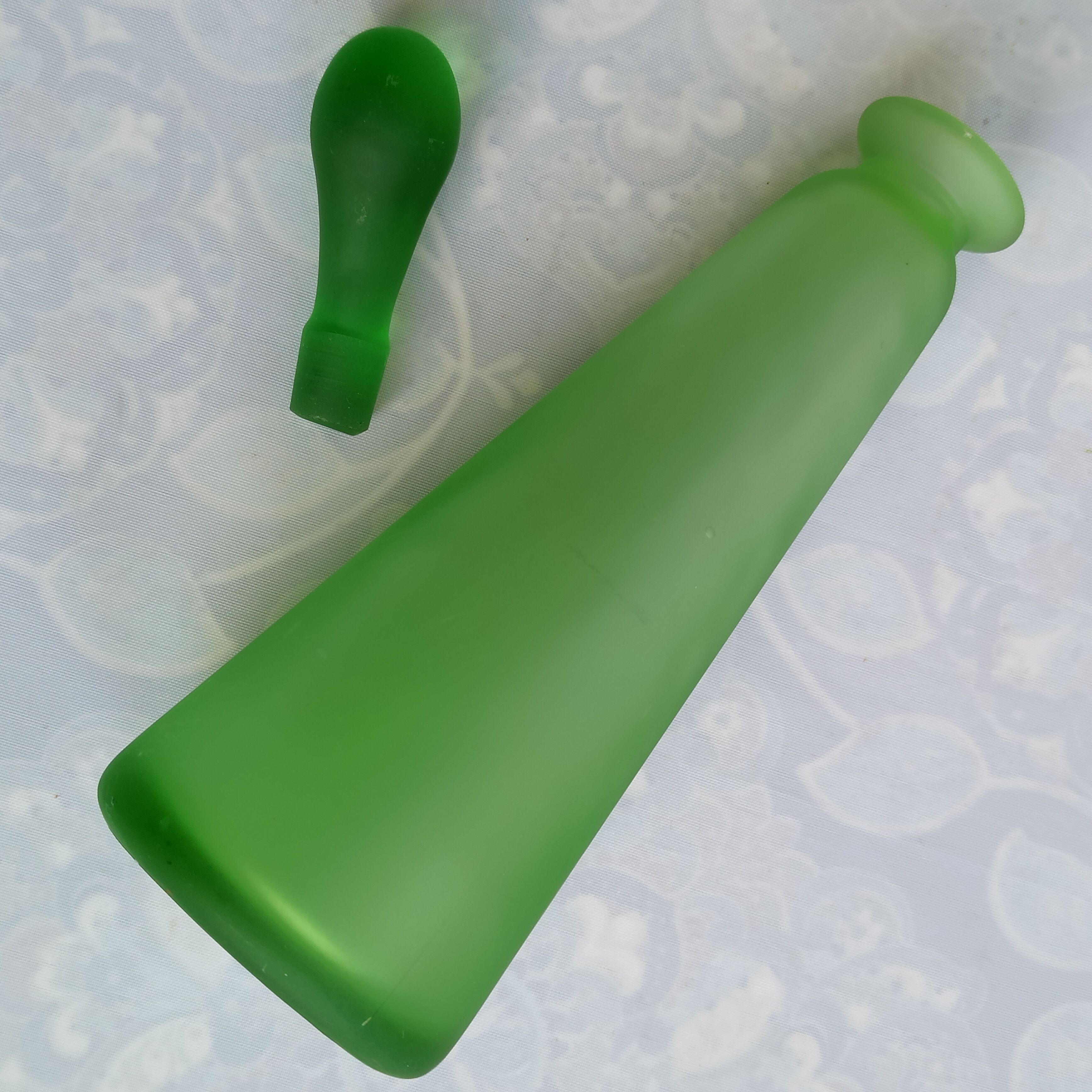 Vintage green satin blown glass bottle