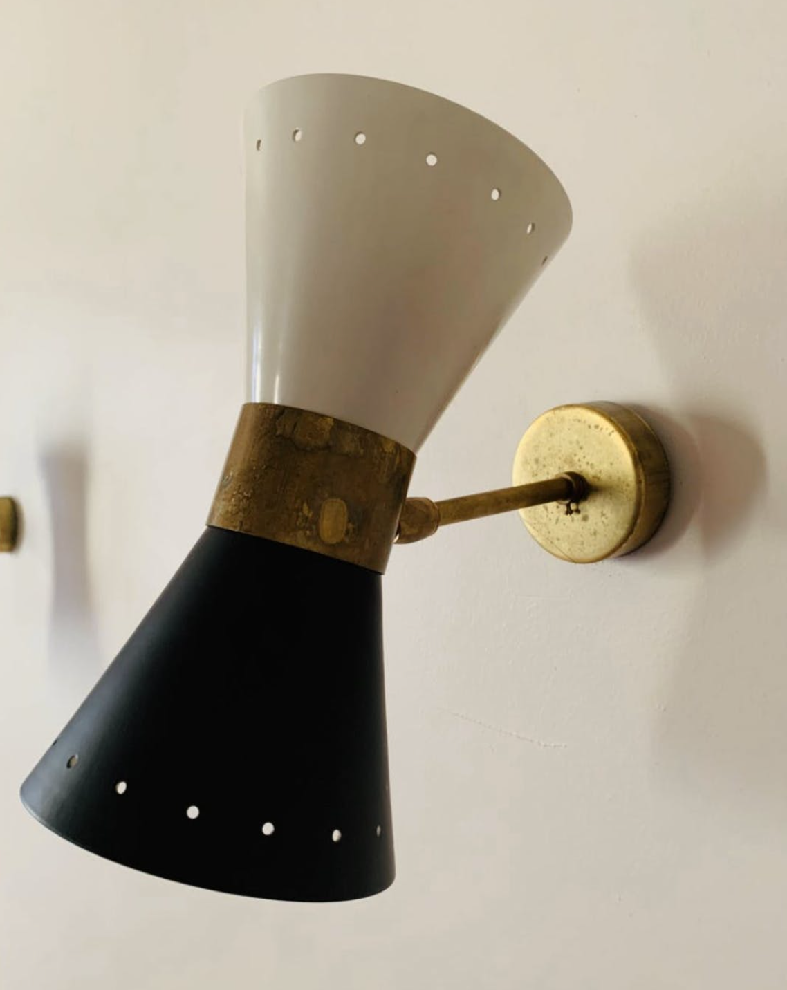 Wall sconce in the style of italian creations of the 50