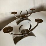 Pair of modernist candlesticks in beaten iron 1970