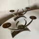 Pair of modernist candlesticks in beaten iron 1970
