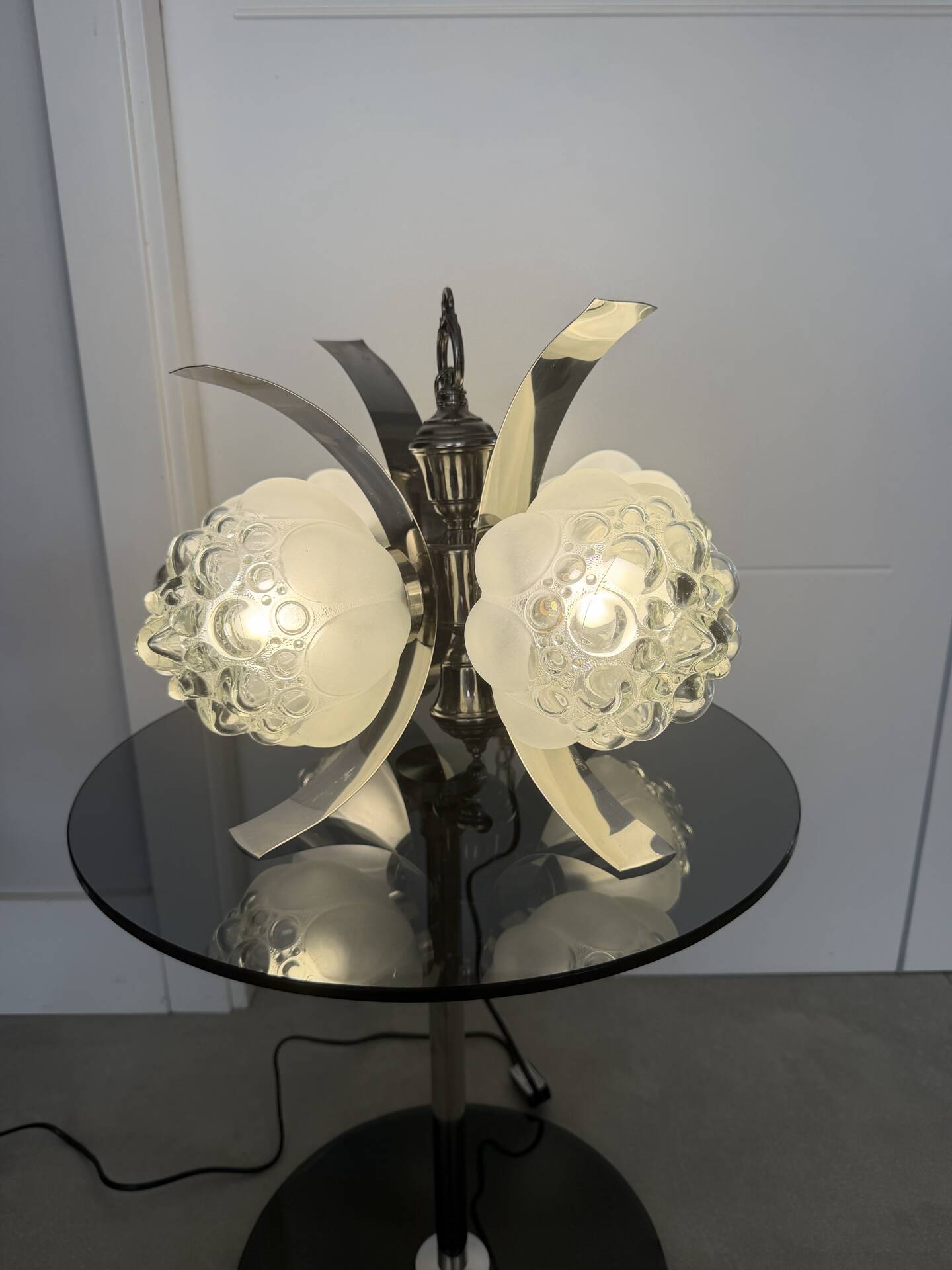 Vintage chandelier with 4 glass bubble globes and silvered metal.